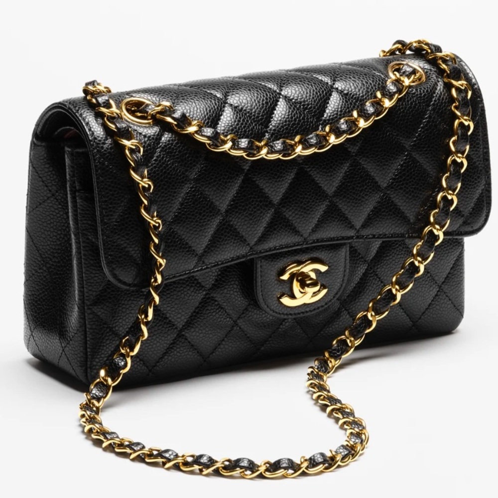 Brand new Medium size Chanel Classic flap. Caviar leather and gold hardware.